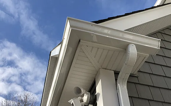 Custom seamless gutter installation for water protection in Taunton MA.