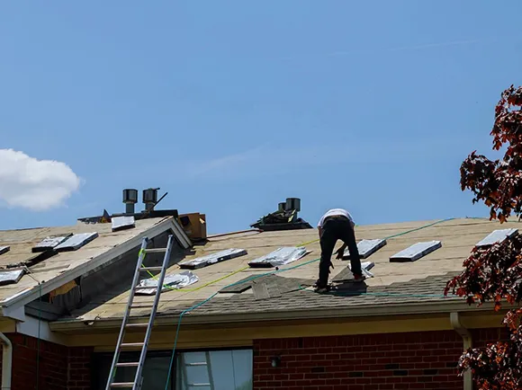 Professional roof replacement services using asphalt, metal, or flat roofing in South Easton.